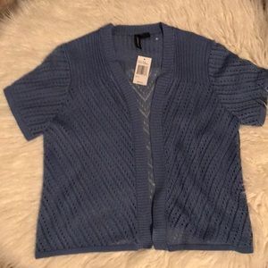 Shrug. NWT. crochet design knit fabric.